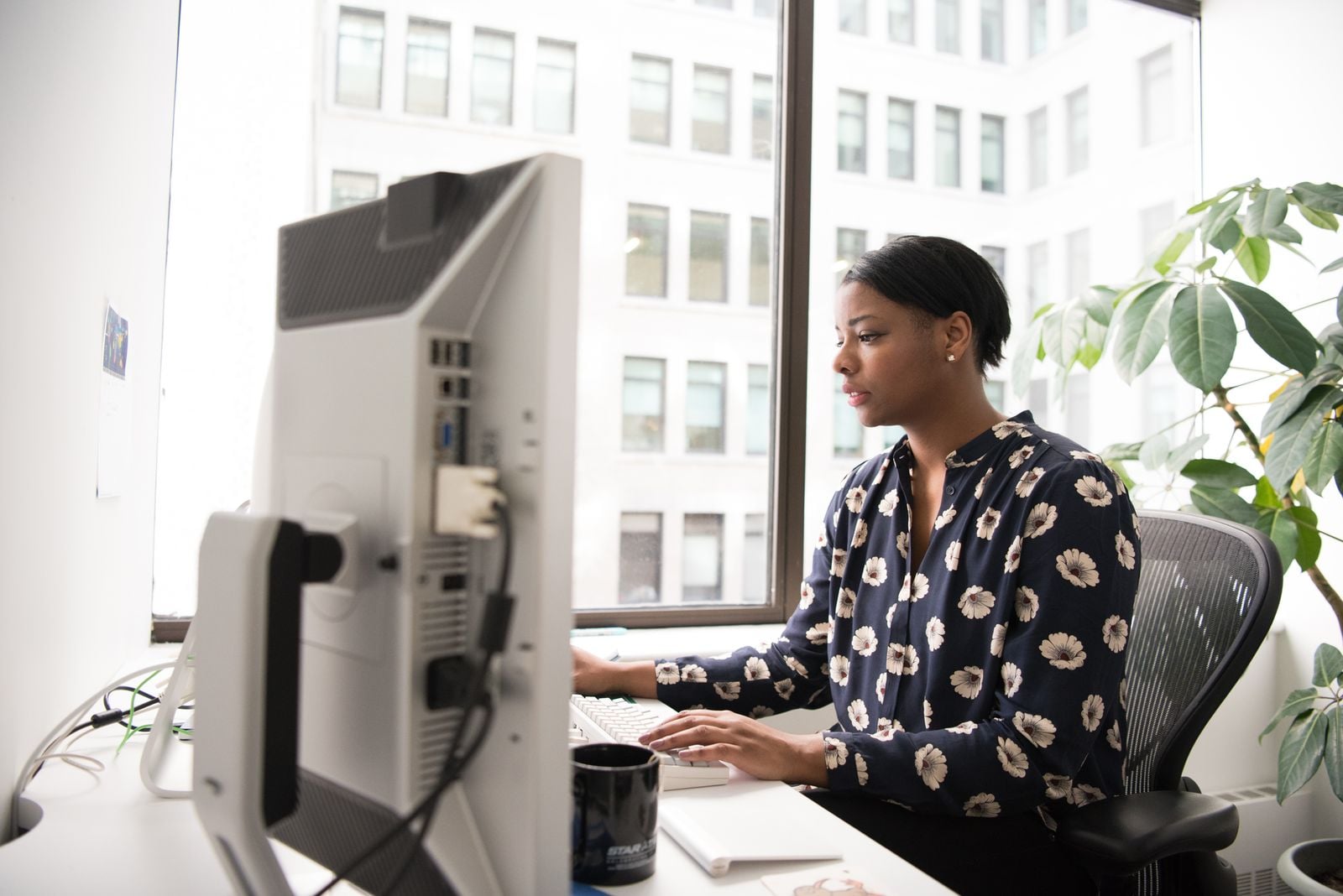 Photo illustrating an ergonomic desk and workspace setup