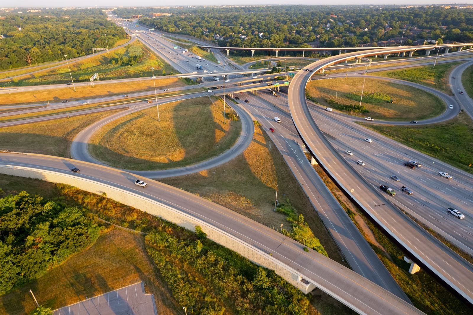 Aerial view of a highway interchange at golden hour
