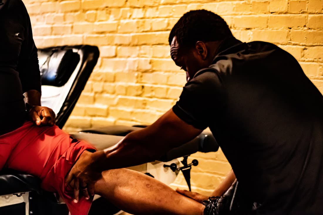 Dr. Kowin Casey treating a patient at KC Wellness and Physiotherapy