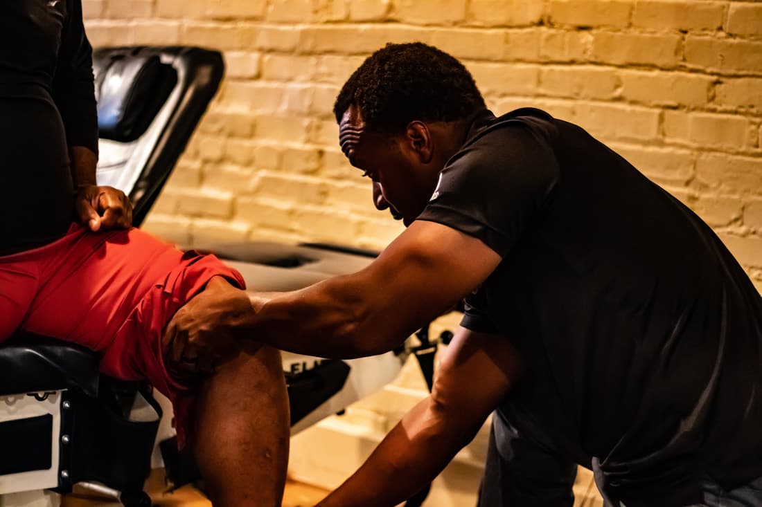 Dr. Kowin Casey treating a patient at KC Wellness and Physiotherapy