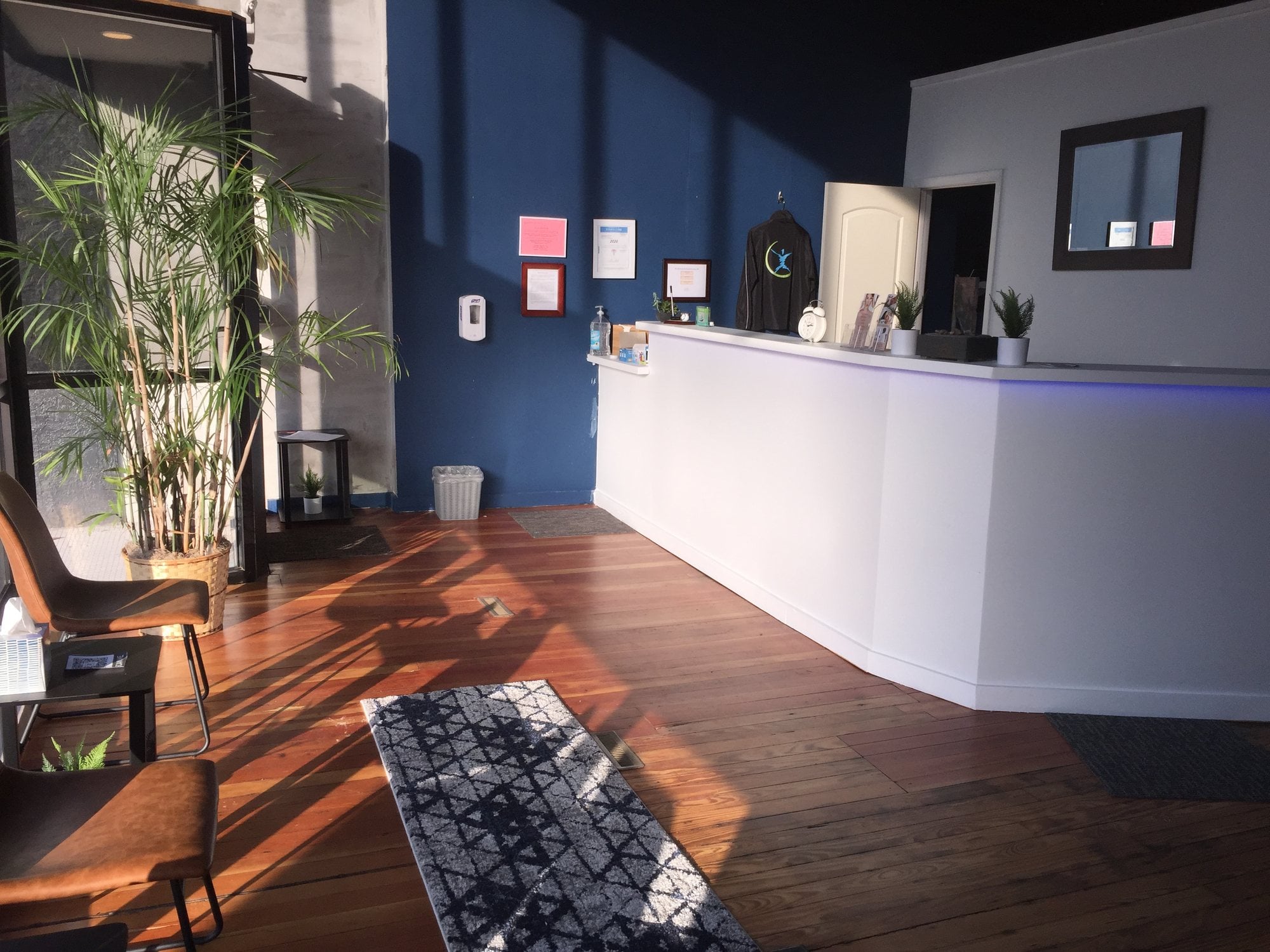 Front desk and waiting area at KC Wellness and Physiotherapy