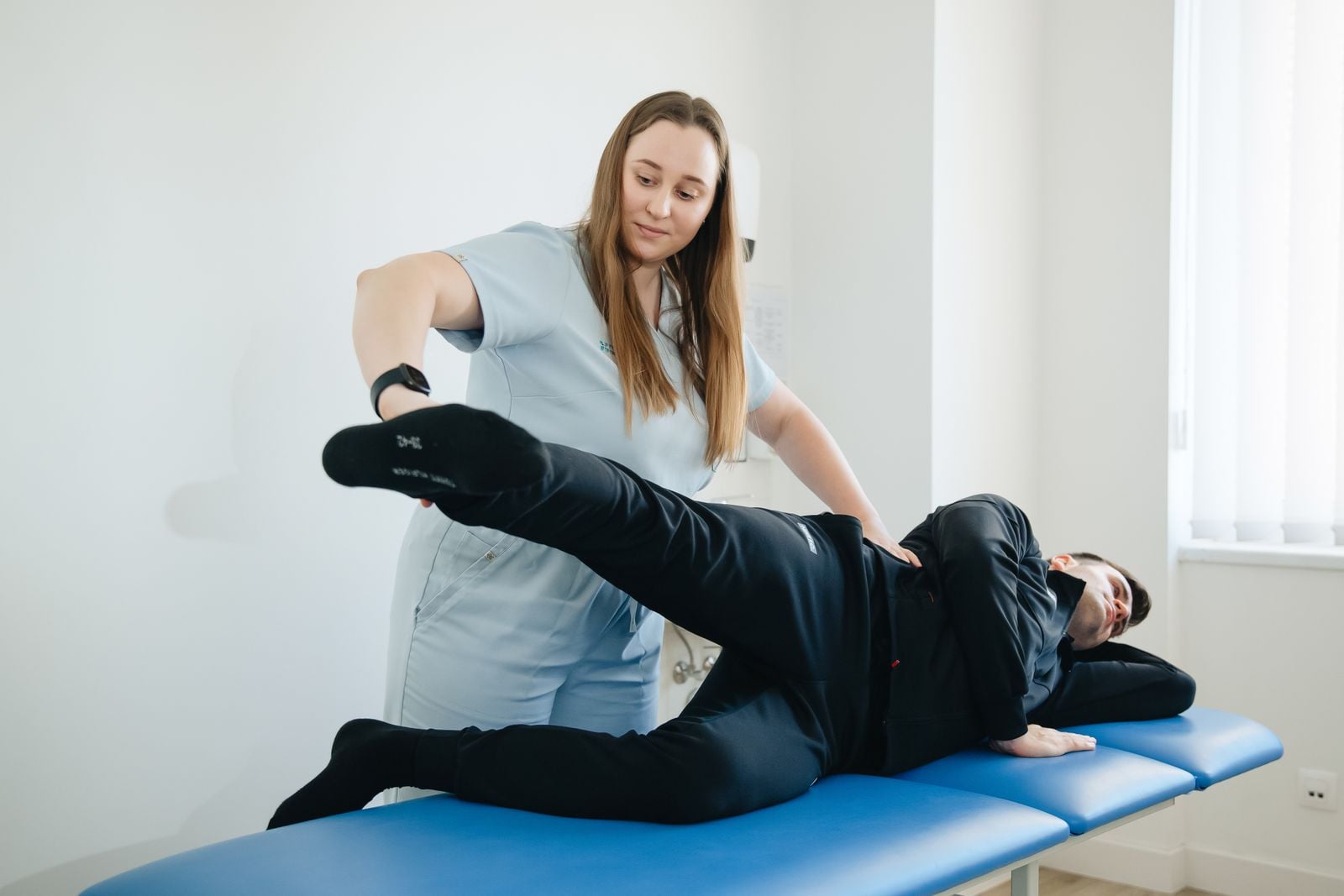 Patient receiving hands-on treatment for hip and leg pain