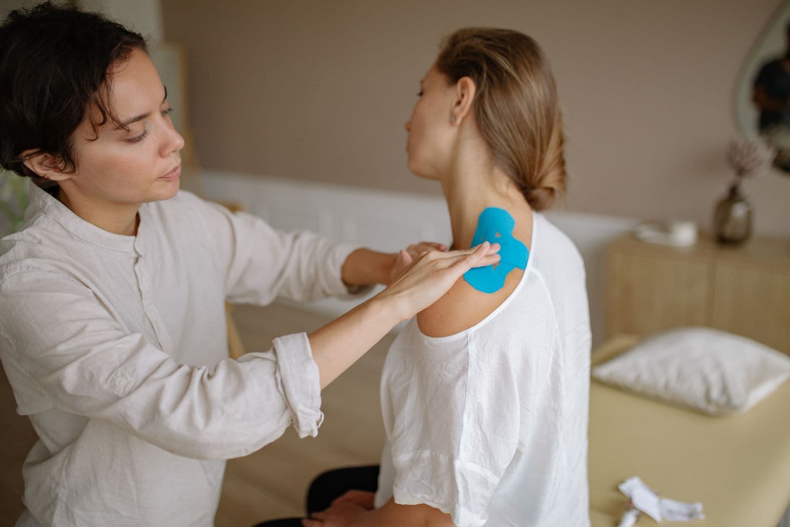 Strips of kinesiology tape applied to support a joint